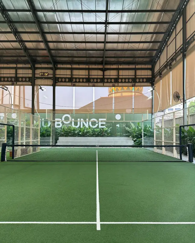 A Bounce court with the logo on the back glass