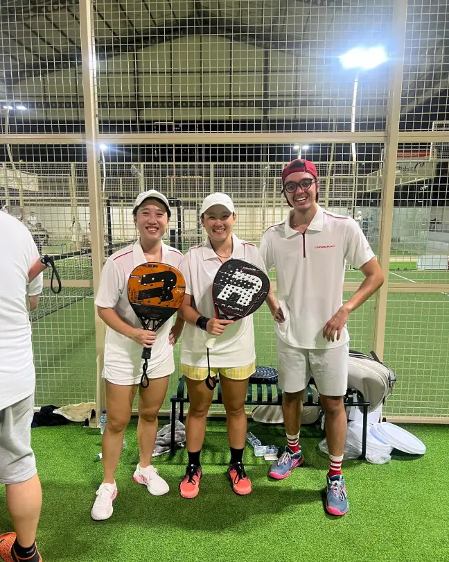 Three players under the lights