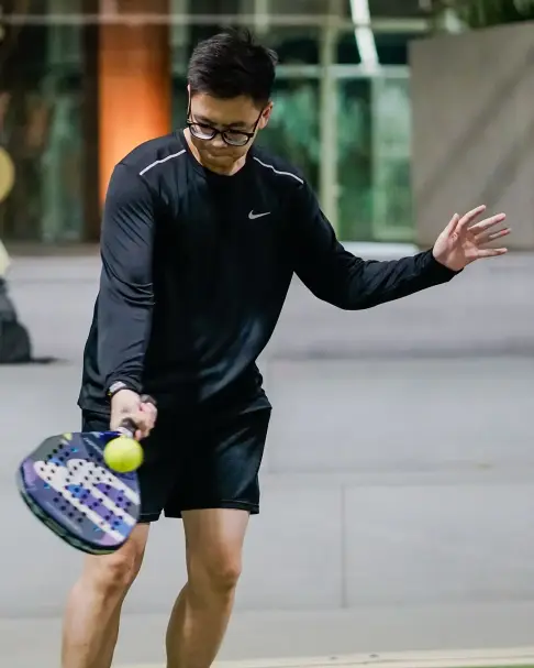 A player hitting a forehand