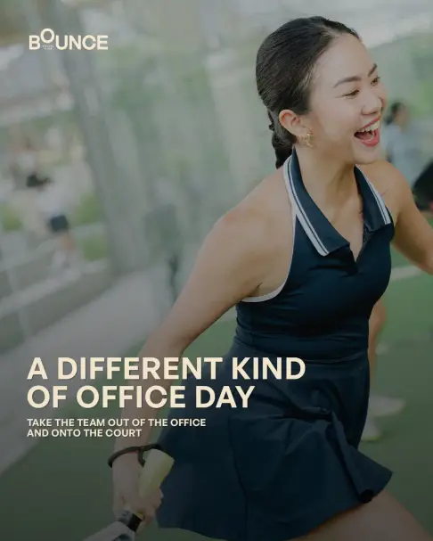 A smiling player mid-swing