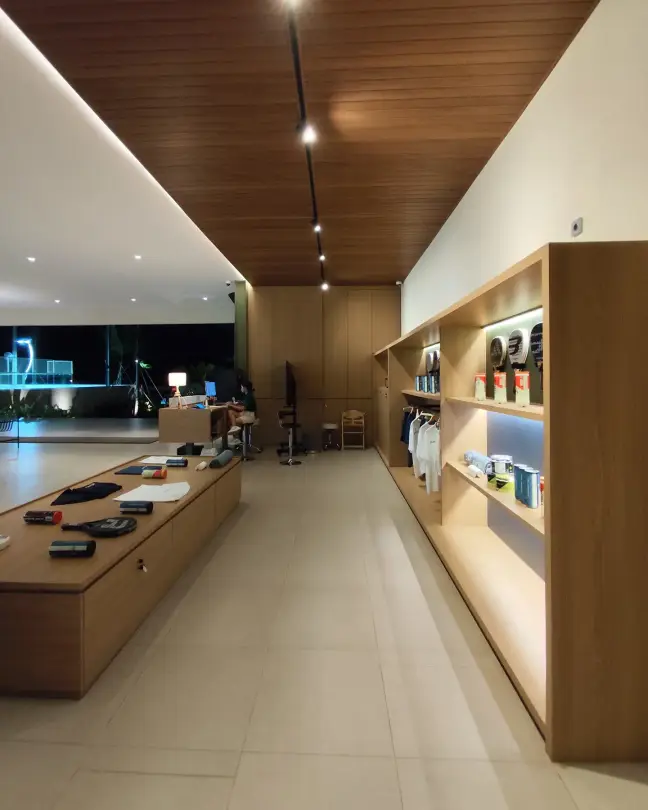 The pro shop with oak shelves